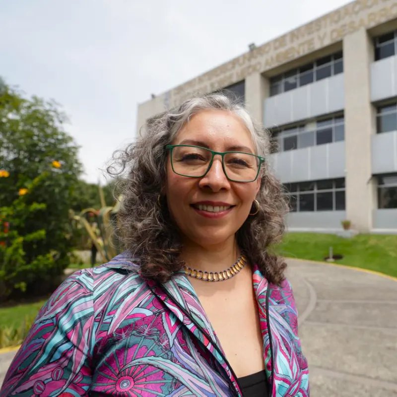 Researcher Laura Arreola Mendoza standing outside the CIIEMAD environmental research center of Mexico's National Polytechnic Institute