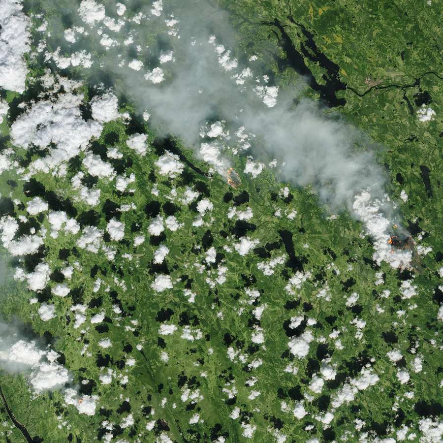 Sentinel-2 satellite view of flames and smoke from forest fires in Sweden on July 17, 2018