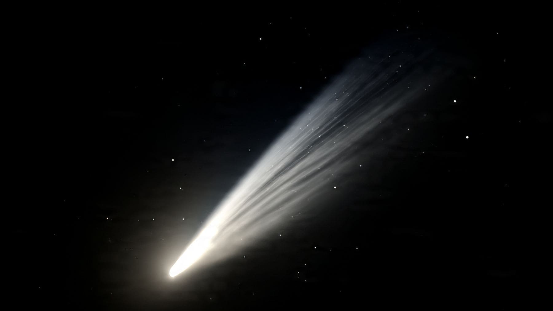 Ilustración de un cometa interestelar brillante con una larga estela de gas y polvo cruzando el espacio profundo