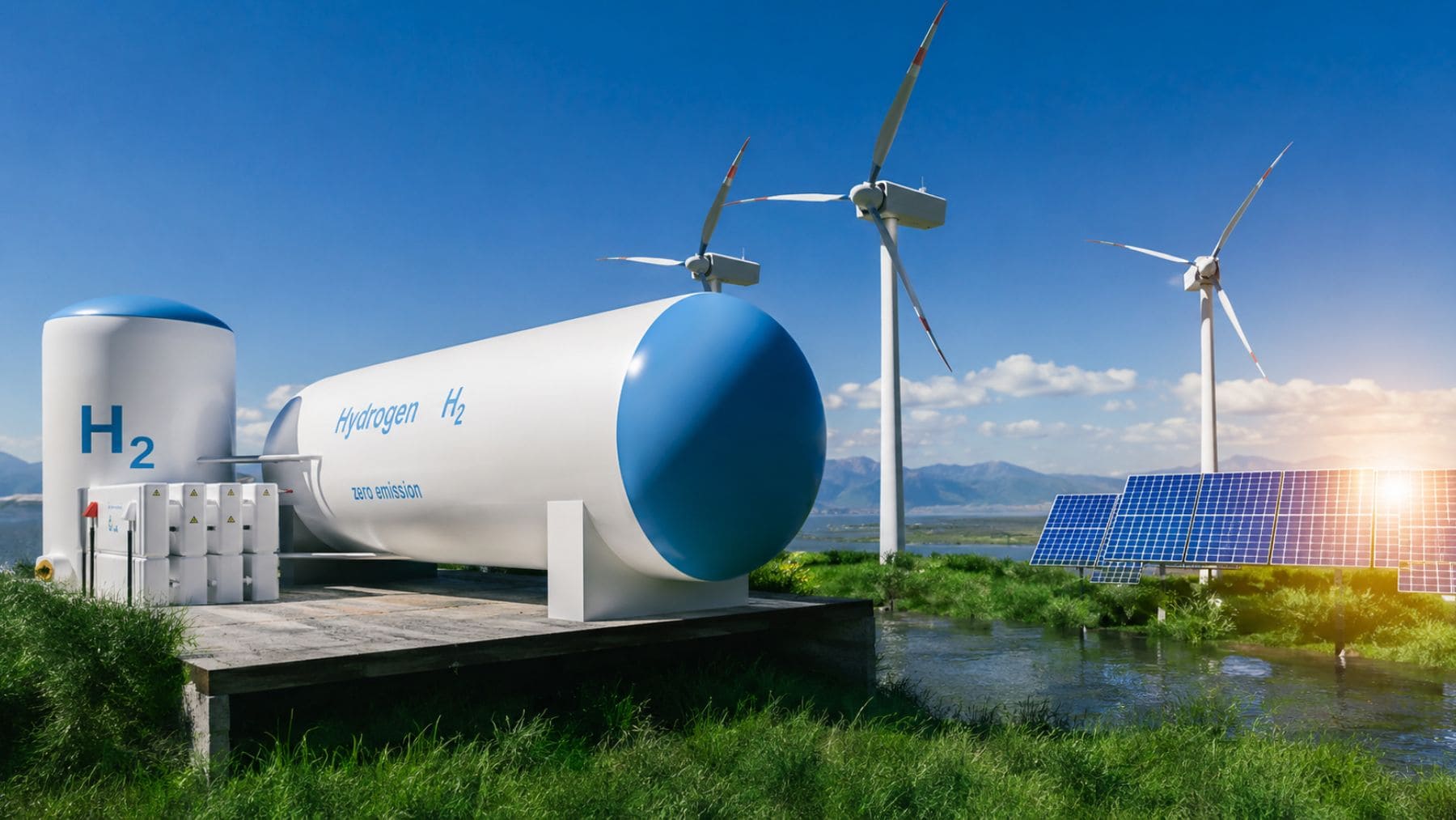 Instalación de hidrógeno verde con depósitos de H2, paneles solares y aerogeneradores en España.