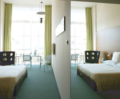 NH contrata energía totalmente renovable