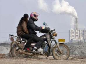 China says environment still suffering growth pains