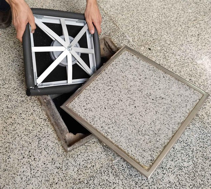 Patentan una tapa adaptable que evita malos olores de arquetas y pozos