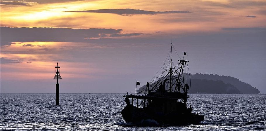sunset evening fishing trawler e1702463694960