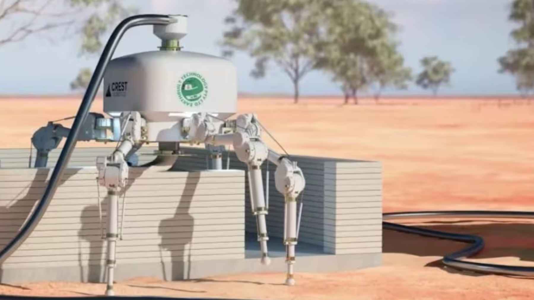 Robot araña Charlotte imprimiendo en 3D una pared con material de arena y residuos en una obra