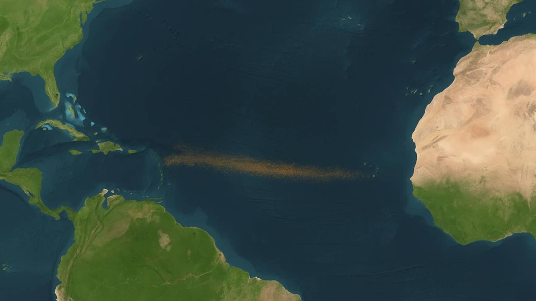 Mapa satelital del océano Atlántico con un cinturón de polvo sahariano en suspensión extendiéndose desde África hacia el Caribe.