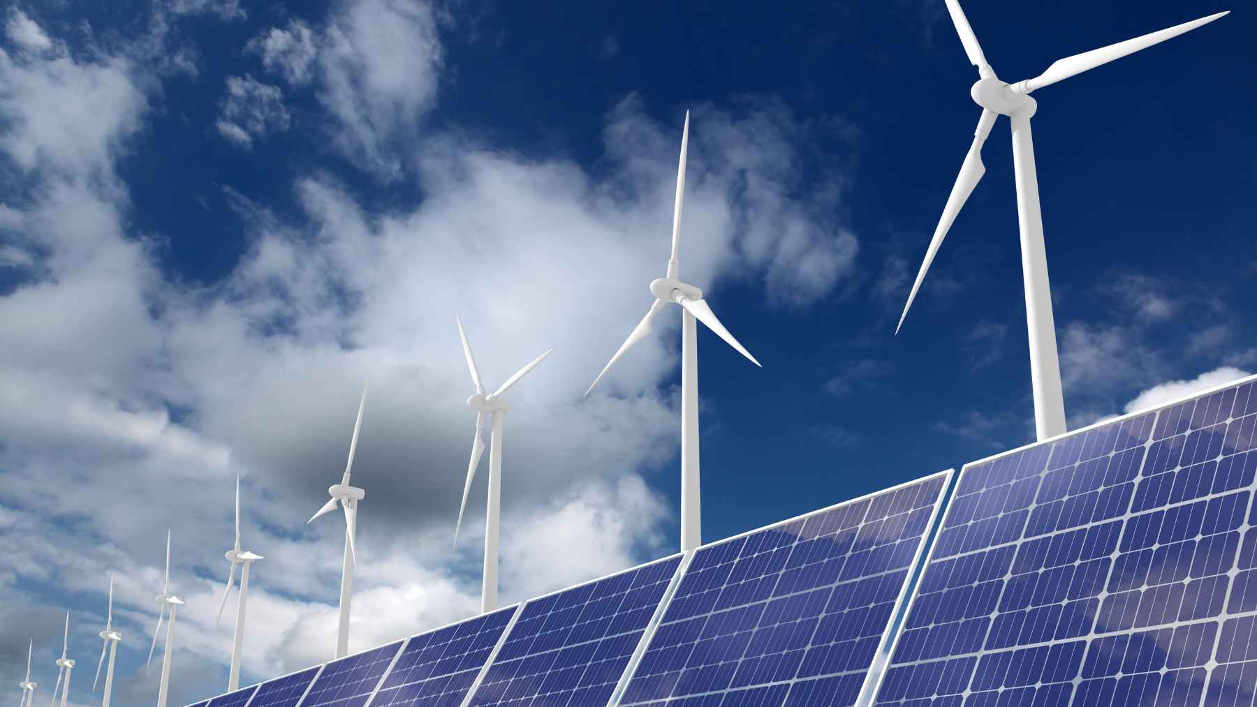 Parque eólico y paneles solares que representan el liderazgo de la energía renovable en la Unión Europea