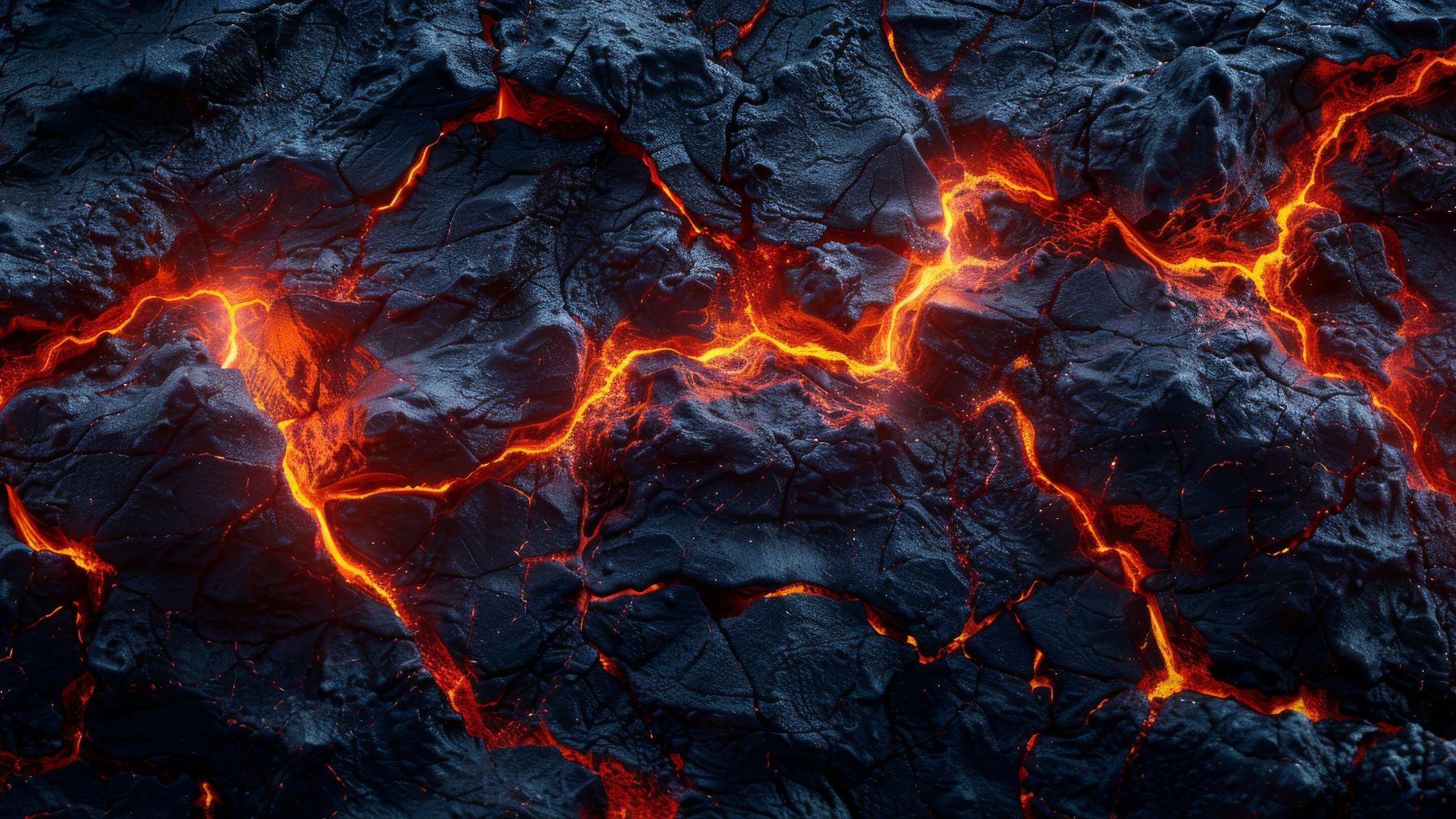 Lava recién solidificada con grietas incandescentes donde comienzan a colonizar microbios en Islandia.